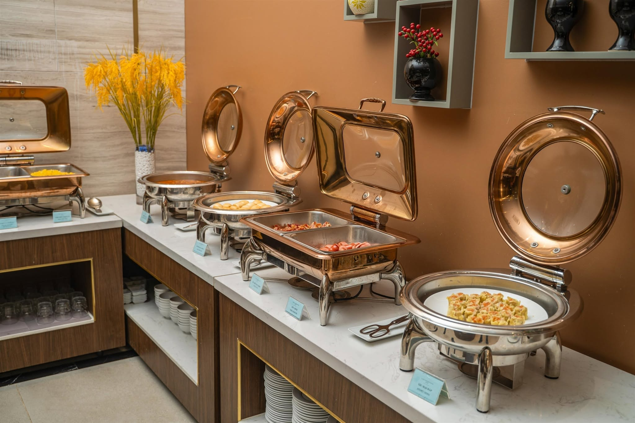 The Indochine-inspired setting creates an elegant atmosphere for enjoying a breakfast buffet