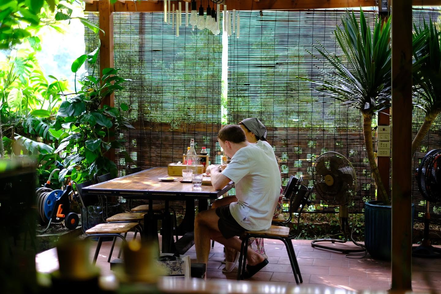 Guests enjoy a light breakfast in the peaceful surroundings of Blue Lagoon Cat Ba