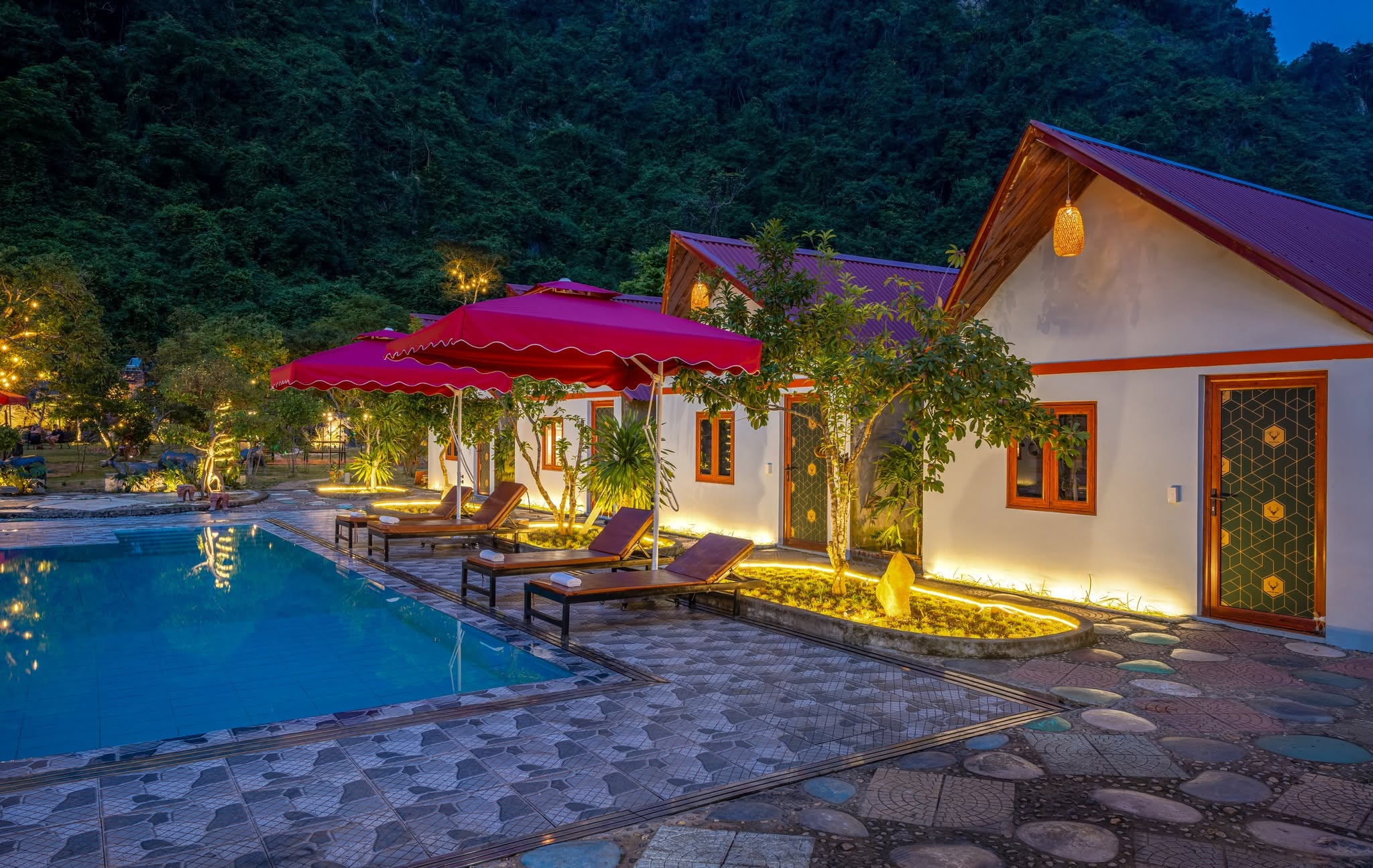 The outdoor swimming pool and modern setting are highlights of Cat Ba Serena Homestay & Swimming Pool